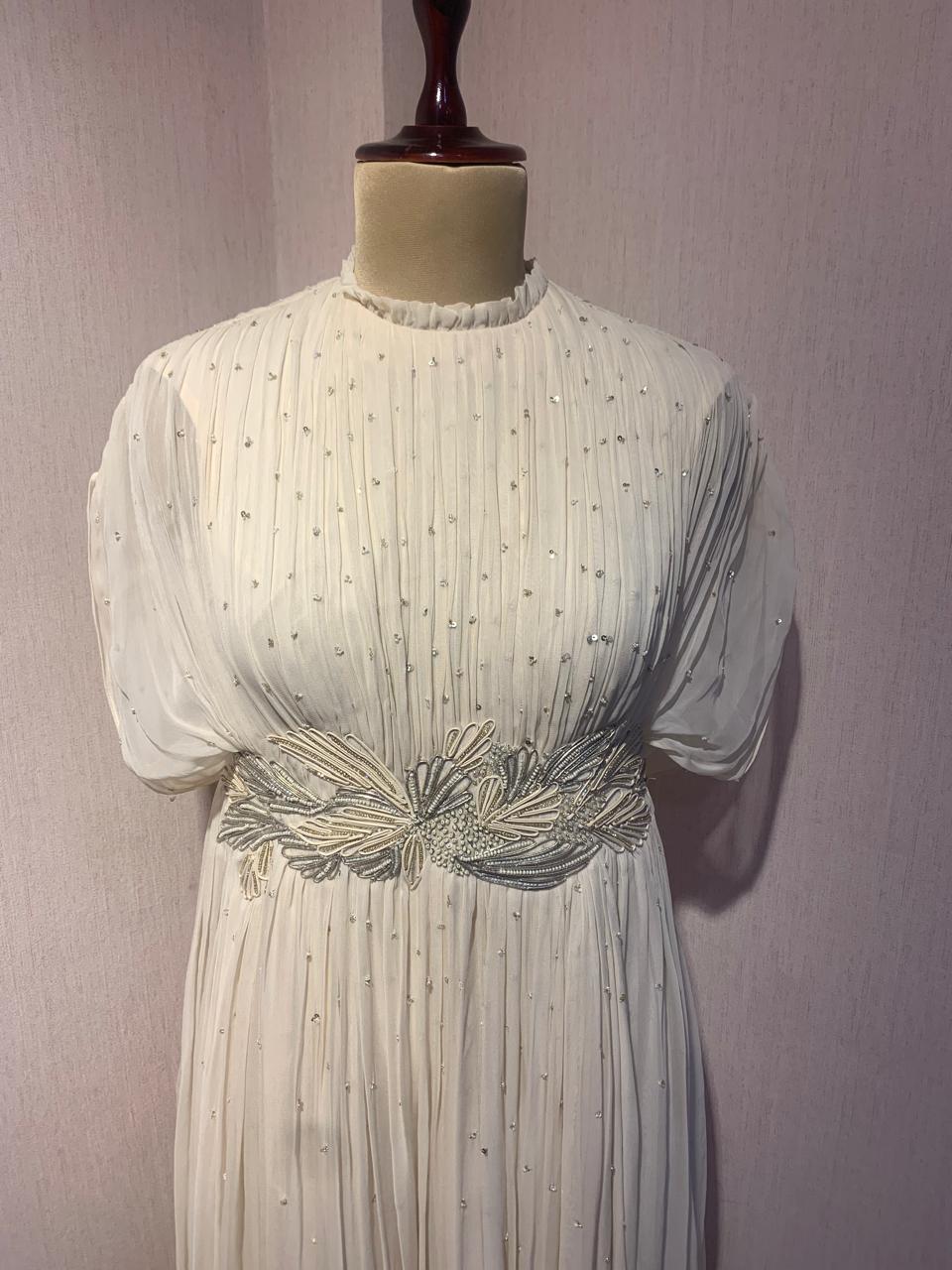 OFF WHITE WIRE EMBELLISHED PLEATED GOWN.