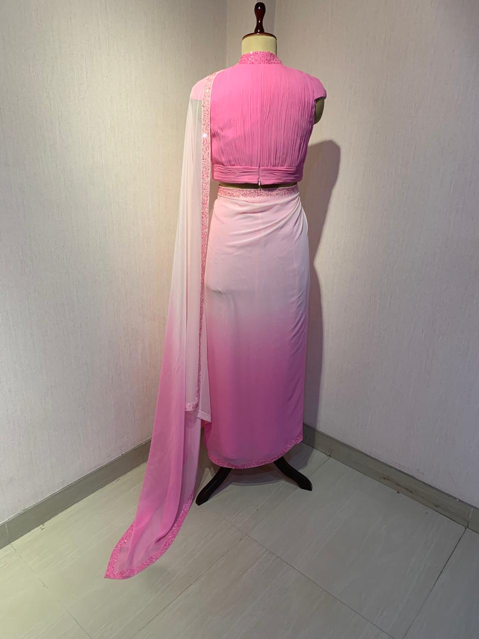 OMBRE GEORGETTE DRAPED SAREE WITH PLEATED HIGH NECK BLOUSE.