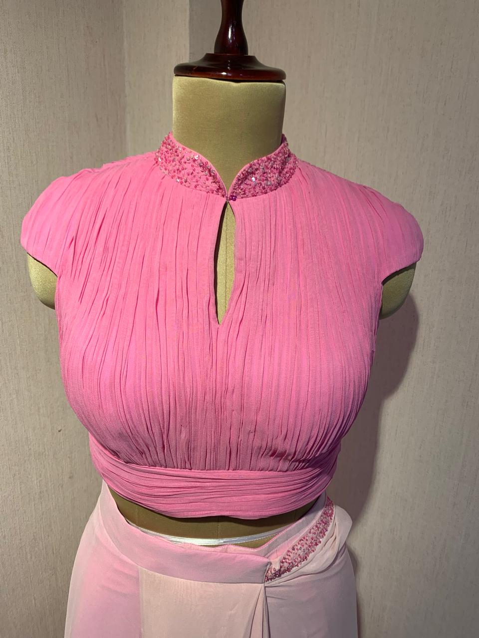 OMBRE GEORGETTE DRAPED SAREE WITH PLEATED HIGH NECK BLOUSE.