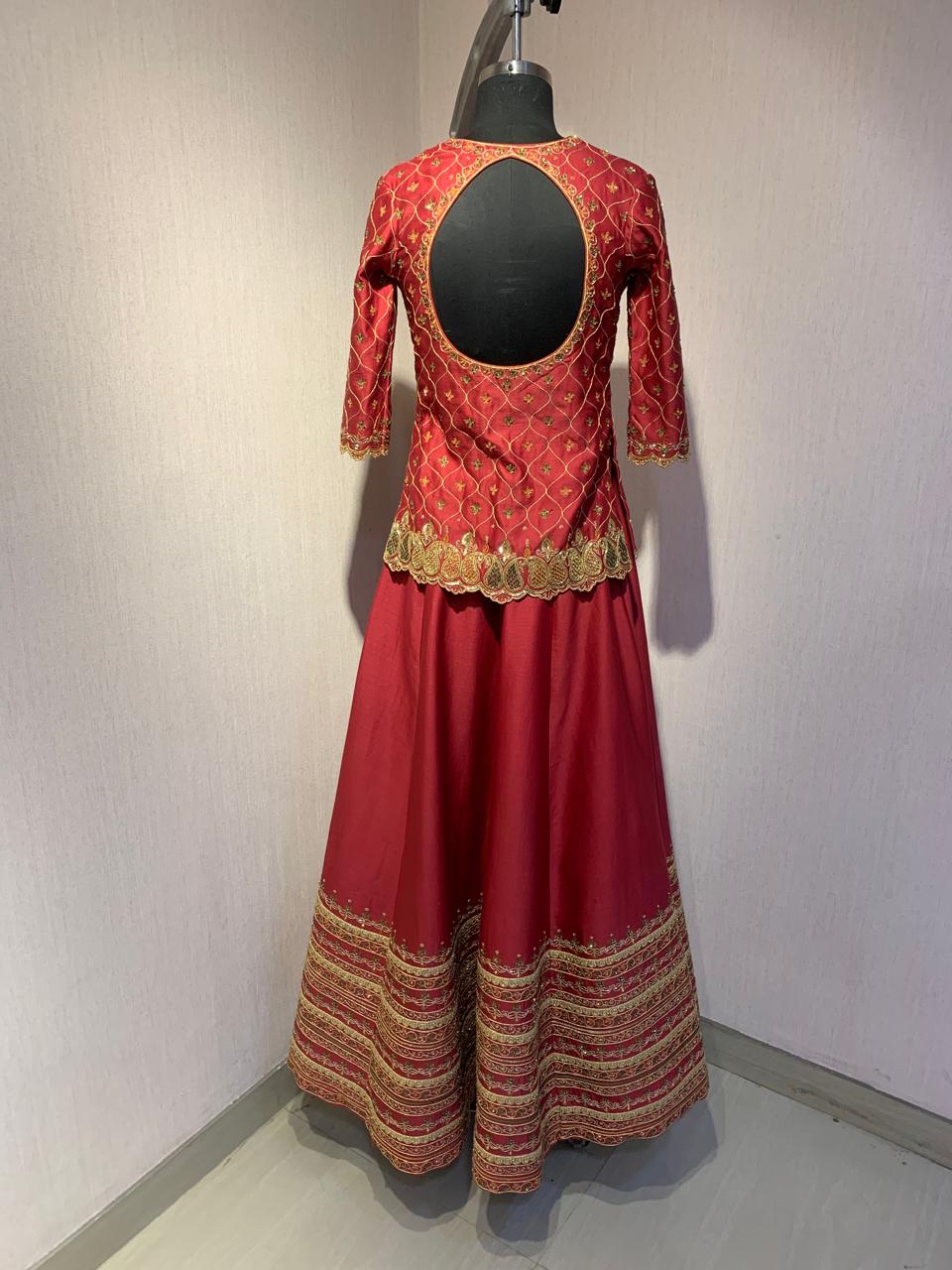 MAROON EMBROIDERED LEHENGA SET WITH BLOUSE AND DUPATTA.