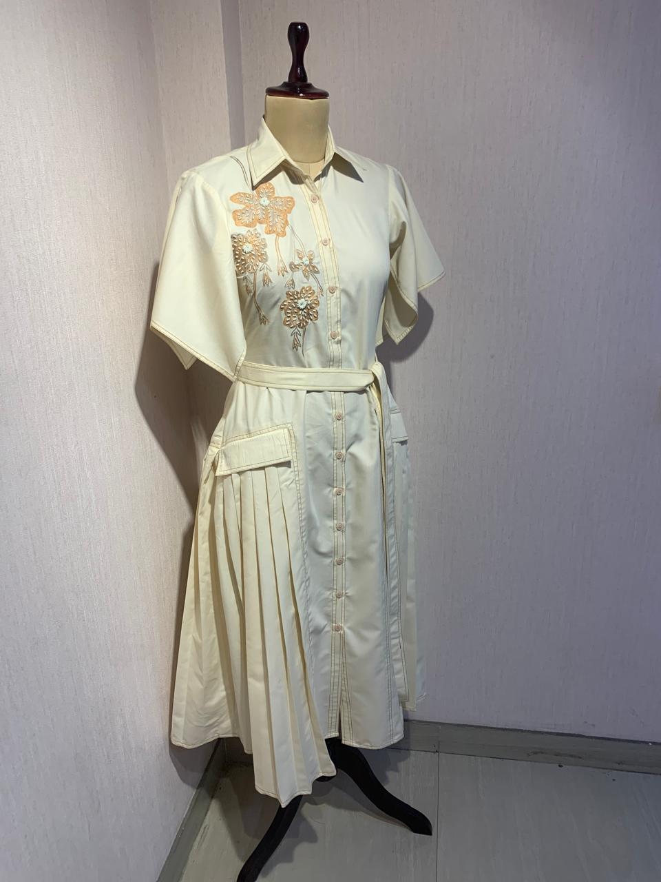 BUTTER YELLOW MIDI DRESS WITH FLORAL EMBROIDERY WITH BELT.