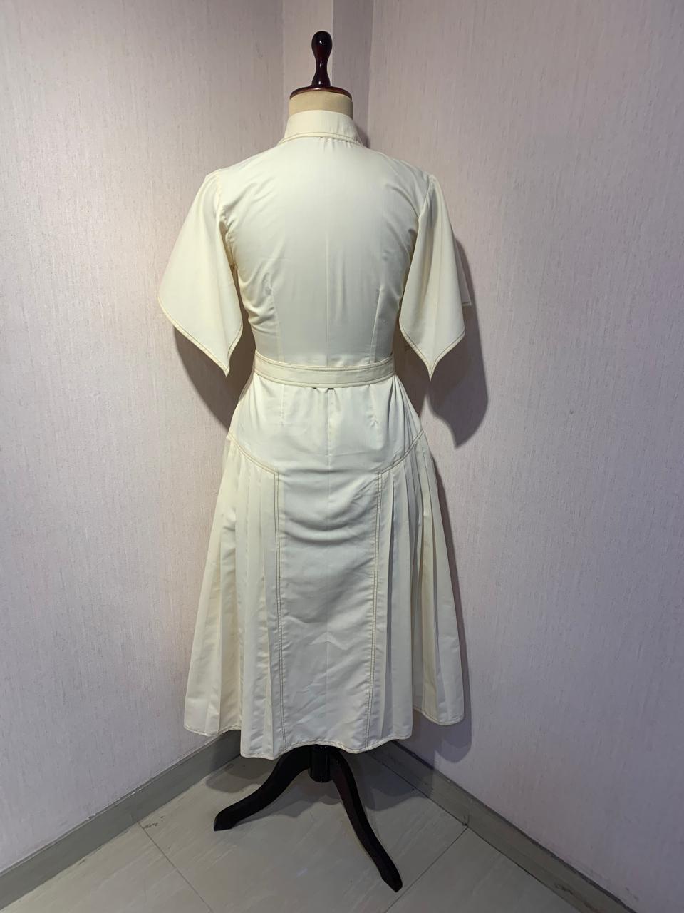 BUTTER YELLOW MIDI DRESS WITH FLORAL EMBROIDERY WITH BELT.