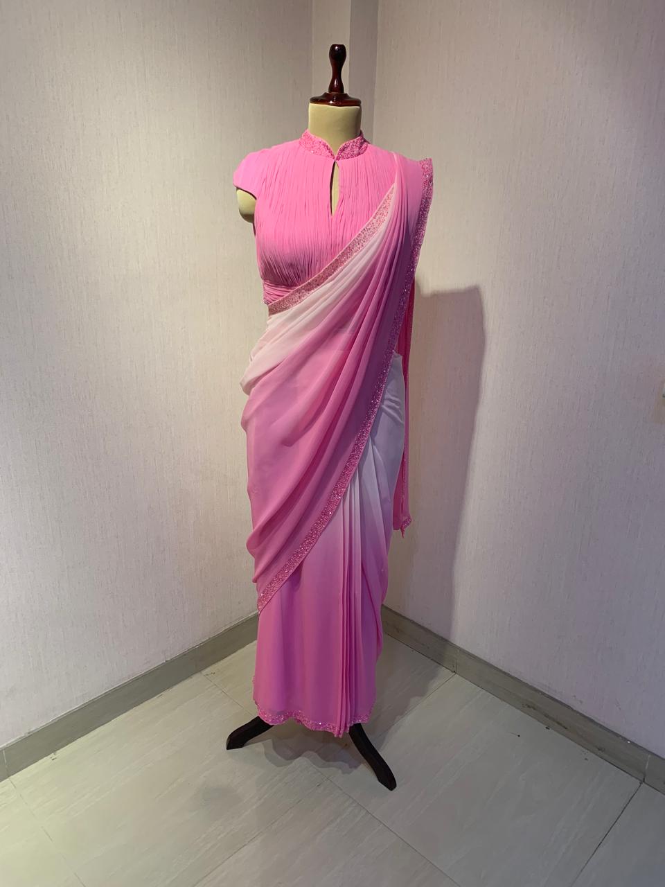OMBRE GEORGETTE DRAPED SAREE WITH PLEATED HIGH NECK BLOUSE.