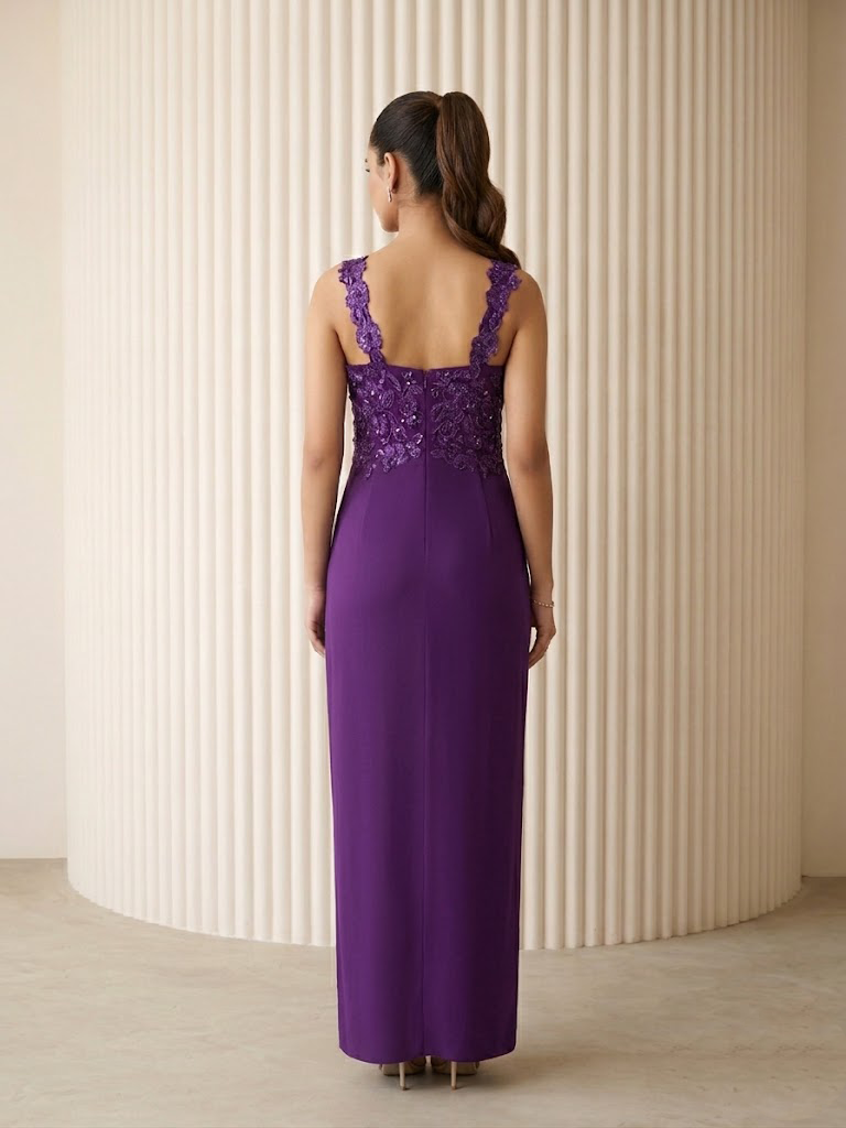 ELEGANT PURPLE EMBROIDERED DRAPED GOWN.