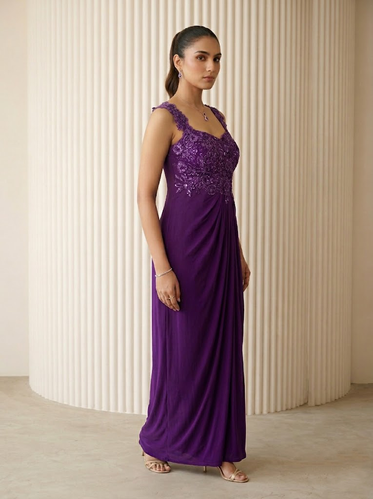ELEGANT PURPLE EMBROIDERED DRAPED GOWN.