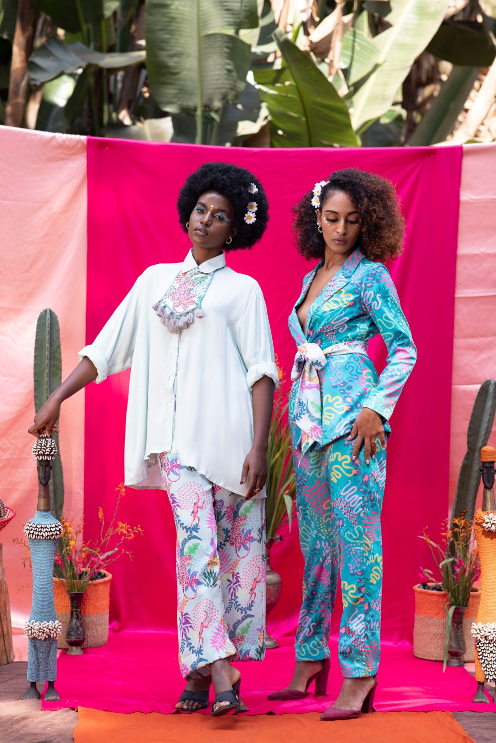 AQUA SHIRT PAIRED WITH PANTS ALONG WITH A NECKPIECE