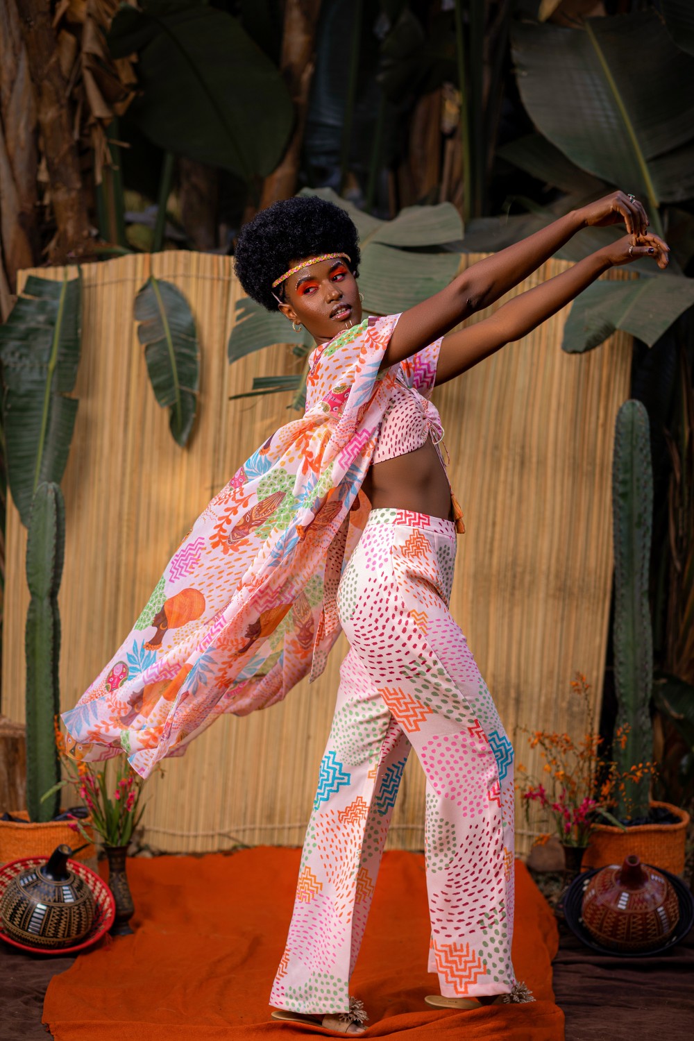 CREAM CAPE WITH TIE UP TOP AND FLARED PANT